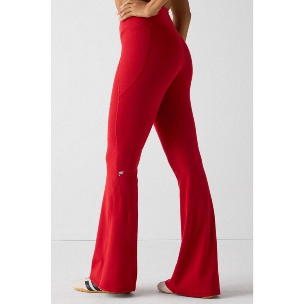 Fabletics Oasis PureLuxe High-Waisted Crossover Flare Leggings Holly Berry